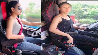 Beautiful Young Woman Professional Truck Driver Sitting And Driving Big Truck Cross Country [upl. by Searcy508]