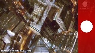 Night base jump in NYC Skydivers plunge from One World Trade Center [upl. by Erine94]