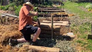 TRANSFORMING a Slope into Small Terraced Vegetable Garden Beds [upl. by Hgeilhsa90]