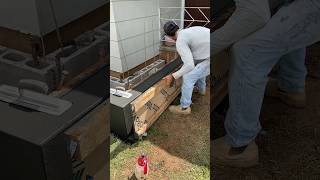 Stripping wet concrete curb in preparation for concretefinishing modern smooth concrete finish [upl. by Zenda20]