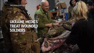 Ukraine medics treat wounded soldiers near Bakhmut [upl. by Aviva122]