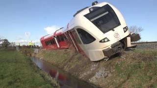 Winsum  Trein ontspoort na aanrijding met vrachtwagen 18 gewonden [upl. by Nylrak]