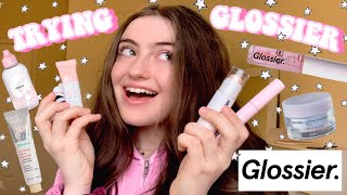 trying GLOSSIER products  skin tint haloscope highlighter lash stick and balm dotcom [upl. by Anaitat]