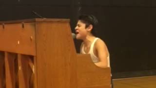 Kid performs Bohemian Rhapsody in front of whole school [upl. by Aritak]