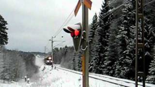 NetRail freight train pulled by Ma 825 Electric locomotive passing a level crossing at Bystad [upl. by Nazler]