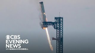 SpaceX catches rocket booster in dramatic landing [upl. by Ravert468]