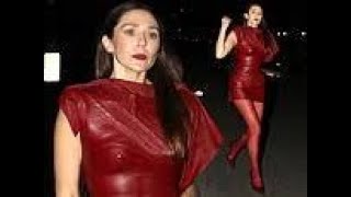 Elizabeth Olsen channels her Marvel character Wanda as she puts on a leggy display in red leather [upl. by Gwyneth]