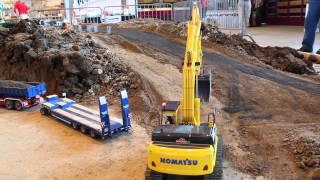 MB Arocs 3363 Meiller Roll onoff tipper RK 2065 delivering a Komatsu PC 490 [upl. by Wolliw28]