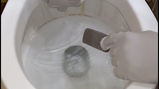 Removing Stains From A Toilet With A Pumice Stone [upl. by Sotsirhc]