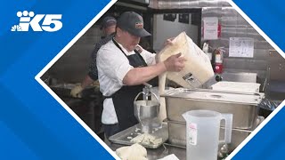 Volunteers prepare holiday meals for the homeless [upl. by Artkele805]