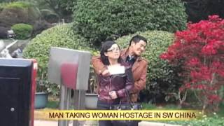 Man taking woman hostage in SW China [upl. by Lamphere]