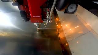 A Fiber Optic Laser Cutting A Sheet of Metal [upl. by Asylla]