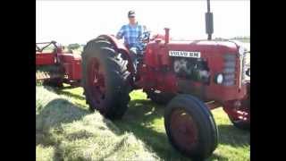 Volvo BM 350 Boxer and Massey Ferguson 20 baler baling hay in the Netherlands [upl. by Euqinim]