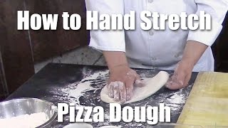 How to Stretch Open Pizza Dough By Hand [upl. by Mohl]