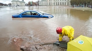 Urban Flood Clearing Out Clogged Drains in the Street [upl. by Duwe]