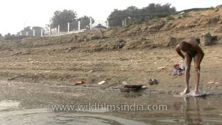 Varanasi famous for the bathing ghats along the banks of river Ganga [upl. by Larsen149]