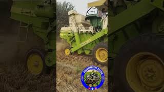 Tractor combine harvester on John Deere 5210 [upl. by Chrysa]