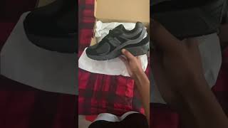 New Balance “Black” 2002r Unboxing [upl. by Gatias]