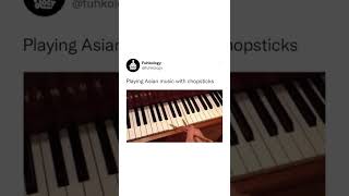 Playing piano with chopsticks 🧧🎶 piano pianomusic pianomusic chopsticks asian music musica [upl. by Samalla]