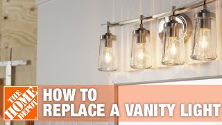 Bathroom Lighting  How to Replace a Vanity Light  The Home Depot [upl. by Inaluiak]