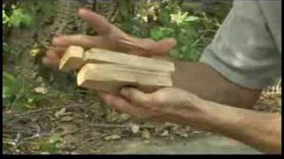 Starting a Fire With a Bow Drill Fire Starter  Making a Bow Drill Fireboard [upl. by Davis596]