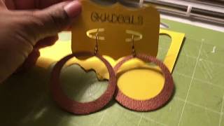 How to make quotBEAUTIFULquot feather earrings [upl. by Nirac]