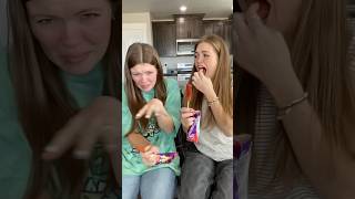 Sisters Audrey and Jordan try Takis Lollipops 🔥 takis tastetest snacks spicyfood [upl. by Annazus]