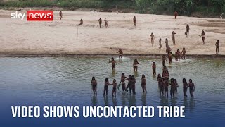 Peruvian Amazon Mashco Piro tribe filmed leaving rainforest [upl. by Leisam249]