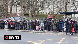 Massive queue outside new dental practice in the hope of getting NHS dental care  SWNS [upl. by Anaig344]