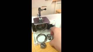 How to pull apart and reassemble the bobbin case area on a front loading sewing machine [upl. by Pearce191]