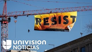 “Resist” el mensaje que Greenpeace puso en una grúa de 270 pies de altura cerca de la Casa Blanca [upl. by Weber]