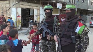 Members of Hamas armed wing parade in Gaza City [upl. by Lontson]