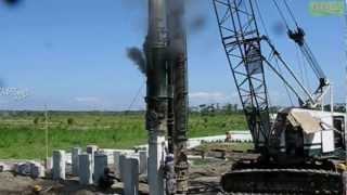 Link Belt Diesel Powered Pile Driver Hammer Working [upl. by Lehcyar235]