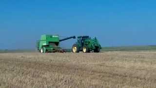 9600 combining John Deere 7510 pulling 2014 Harvest [upl. by Okimik]