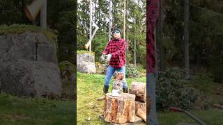 Chopping firewood in Finland  flying axe and two logs [upl. by Elephus]