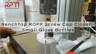 RPM Packaging Machinery  Benchtop ROPP Screw Cap Closer  Small Glass Bottles [upl. by Enidlarej]