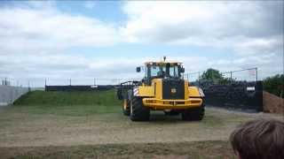 JCB 434s Loading Shovel Clamping Silage [upl. by Anelrihs]