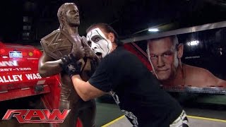 Sting destroys Seth Rollins statue Raw September 7 2015 [upl. by Anegal31]