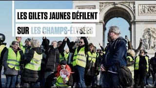 A Paris des gilets jaunes ont défilé sur les ChampsElysées [upl. by Agace328]