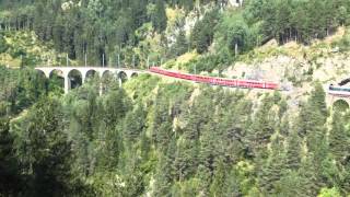 The Bernina Express crossing the Landwasser Viaduct near Filisur [upl. by Hanley]