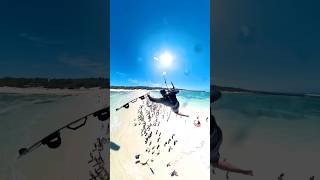 Kite surfer JUMPS OVER hundreds of people on a beach stighoefnagel kitesurfing surfing ocean [upl. by Nosmoht]