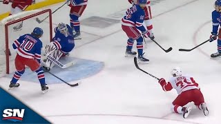 Red Wings Justin Holl Finds Dylan Larkin For BuzzerBeating Goal vs Rangers [upl. by Hcab923]