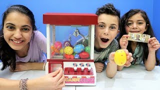 Claw Machine Game Toy Challenge with Surprise Egg [upl. by Aznerol]