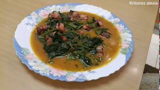 Χταπόδι με σπανάκι Octopus with spinach Greek daily recipes [upl. by Howell]