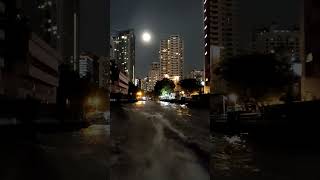 Longboat speeds through Bangkok skyscrapers on full moon [upl. by Teillo852]