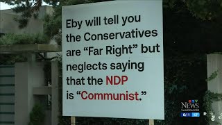 Sign calling BC NDP quotcommunistquot seen outside Lululemon founders home [upl. by Novehc]