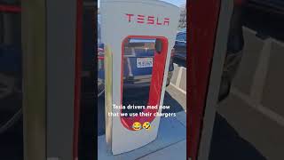 Tesla drivers dont get aggressive about it Youve been hogging our FREE chargers this whole time [upl. by Hnah]