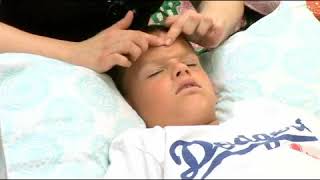 Massaging Nose of Child to Treat Sinus Congestion [upl. by Eicam]