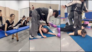 Chinese dance flexibility training course Male teacher helps girls with training2 bpg [upl. by Htiekal]