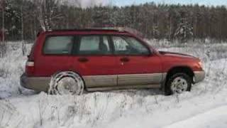 Subaru Forester in snow get two wheels off the ground [upl. by Rolan]